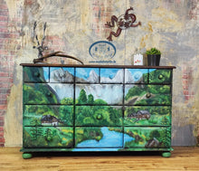 Load image into Gallery viewer, 1196- Kommode mit Landschaftsbild - handgemalt