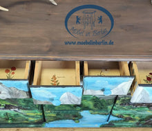 Load image into Gallery viewer, 1196- Kommode mit Landschaftsbild - handgemalt